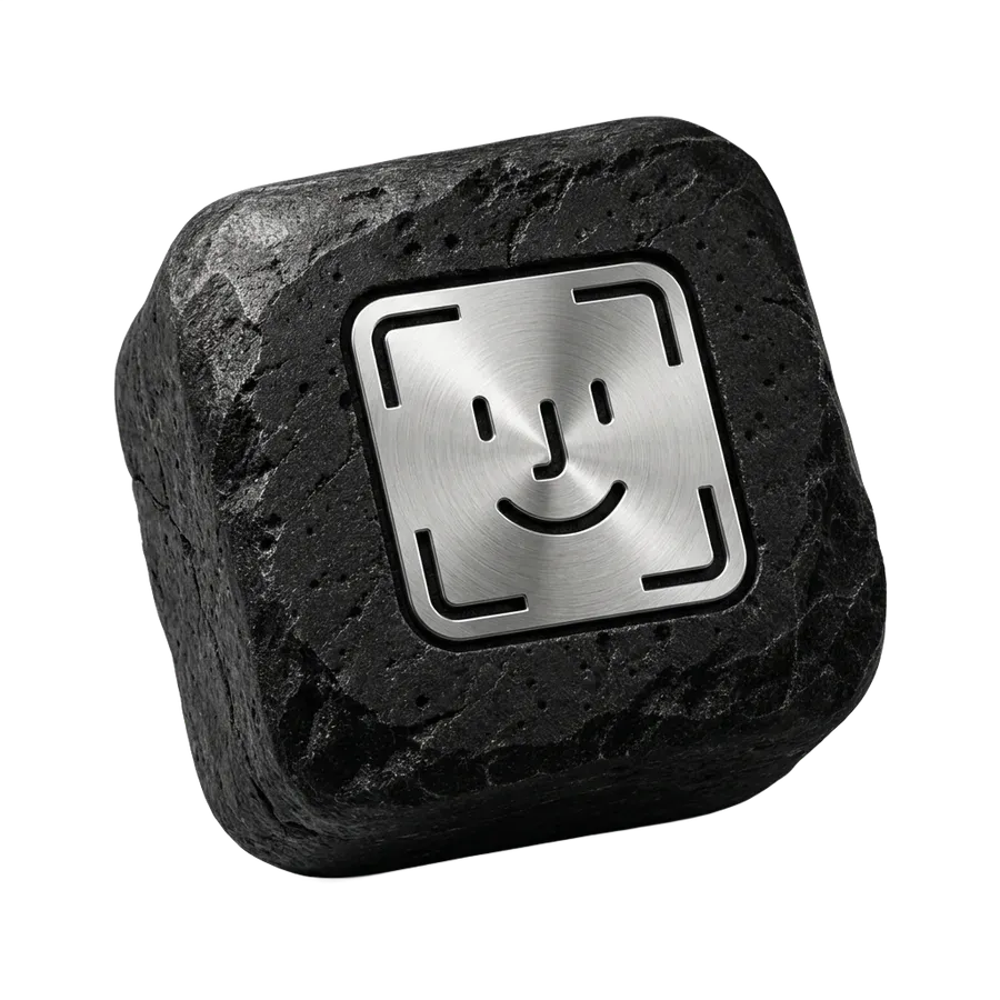 A black basalt stone with a brushed steel face-scan frame, standing for Face ID protection
